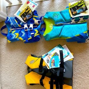 3 life vests- NWT